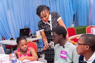 Teens in a circle at a Heritage Gardens session
